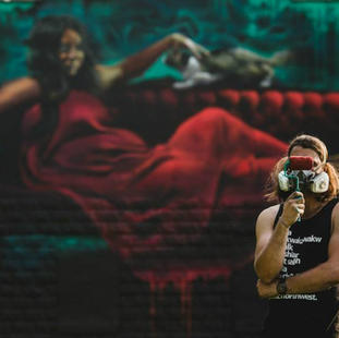 Emmanuel Jarus is a Canadian-born artist and muralist
inspired by the visual human experience. His work reimagines how art can exist in public spaces. For the past 10 years, Jarus has been working with communities across
Canada and around the globe to produce large-scale portraits and figures among other images on wall surfaces.
They can be found within major cities as well as across rural settings. He has had notable international recognition as a contemporary muralist and figurative painter.
It is Jarus' mission as an artist to observe life, interpret and
visually reflect these experiences through his mural work. Allowing space for the mural to organically create itself takes precedence as the site's surroundings primarily
inspire the mural content.